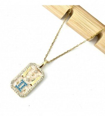 Collares acero dorado...
