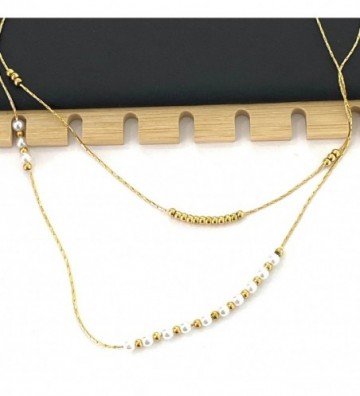 Collares acero dorado...