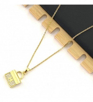 Collares acero dorado...