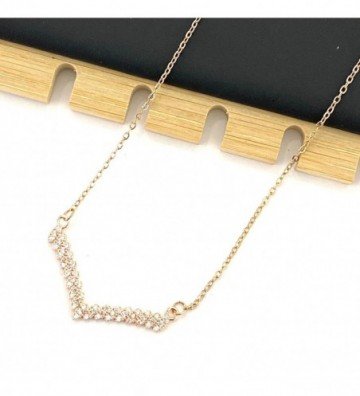 Collares acero dorado...