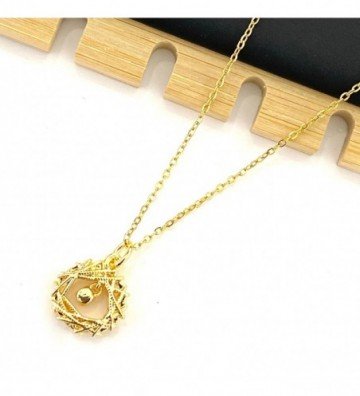 Collares acero dorado...
