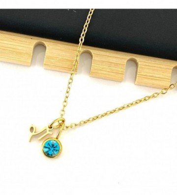 Collares acero dorado...