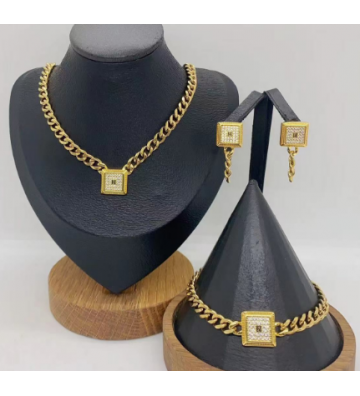 Pendientes acero Dorado...