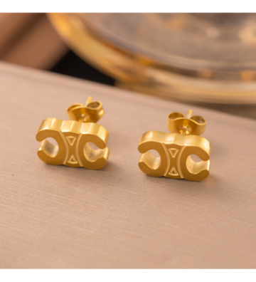 Pendientes acero Dorado...